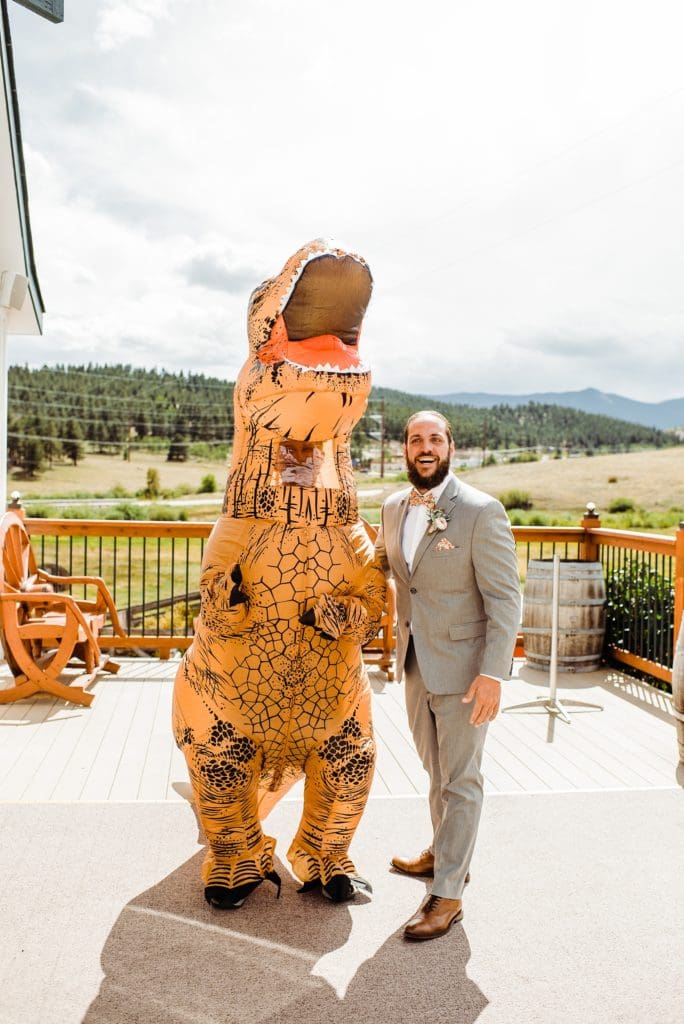 bride plays prank on groom with t rex costume