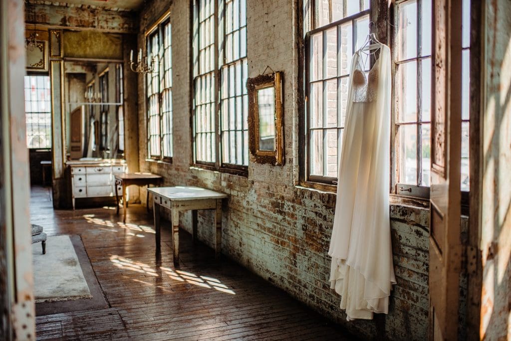 wedding dress in a large window