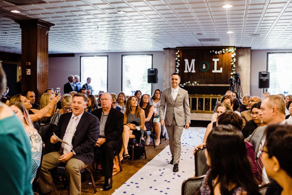 indoor wedding ceremony at the club on peterson air force base