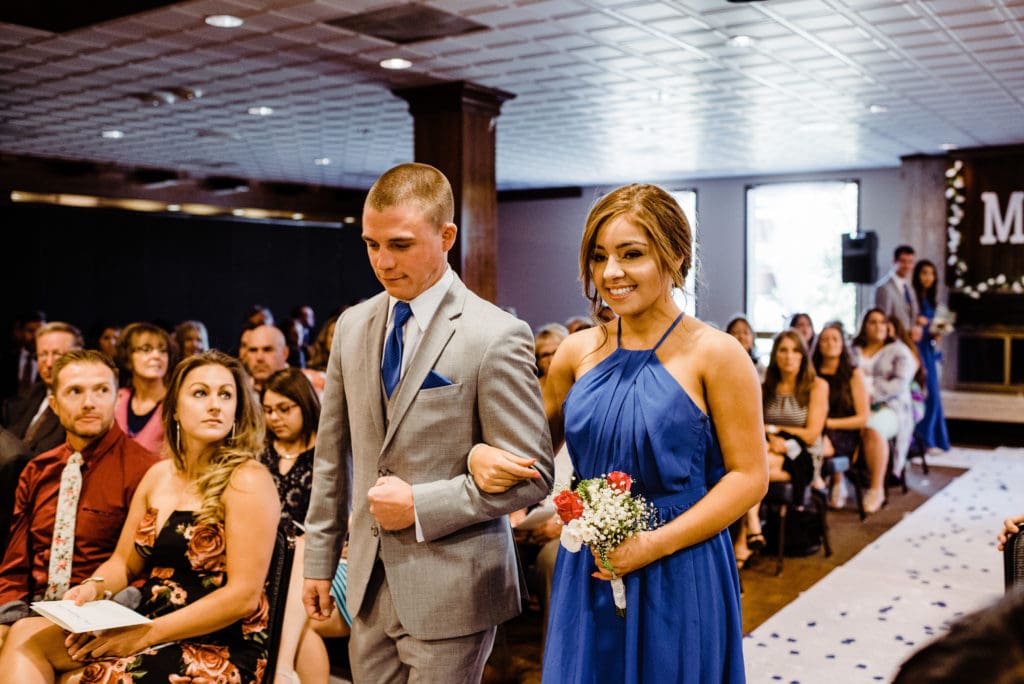 indoor wedding ceremony at the club on peterson air force base