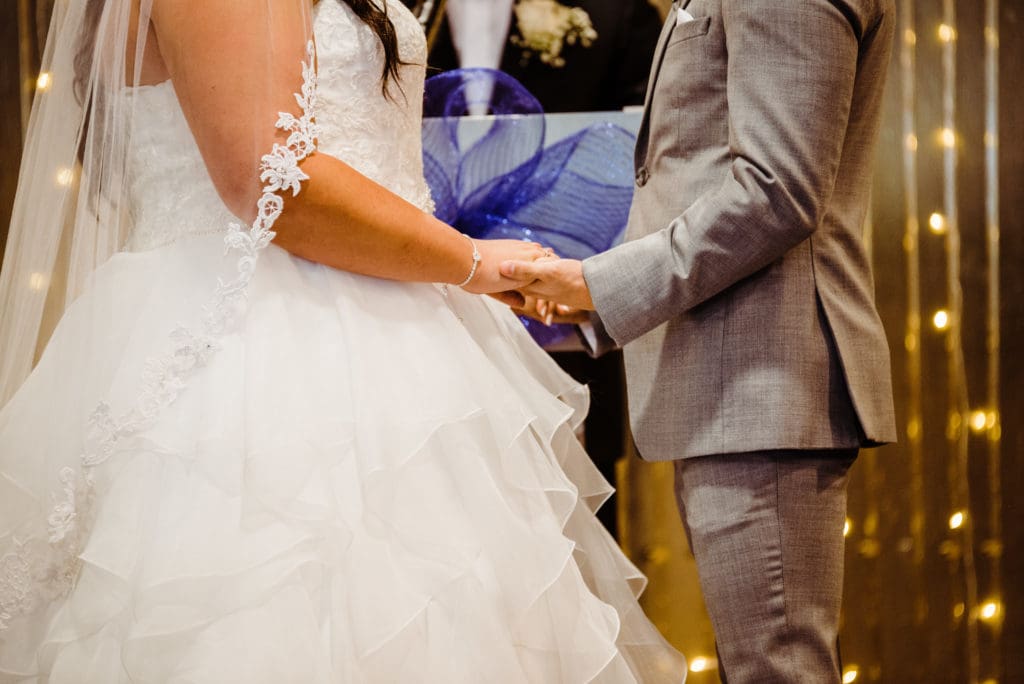 indoor wedding ceremony at the club on peterson air force base