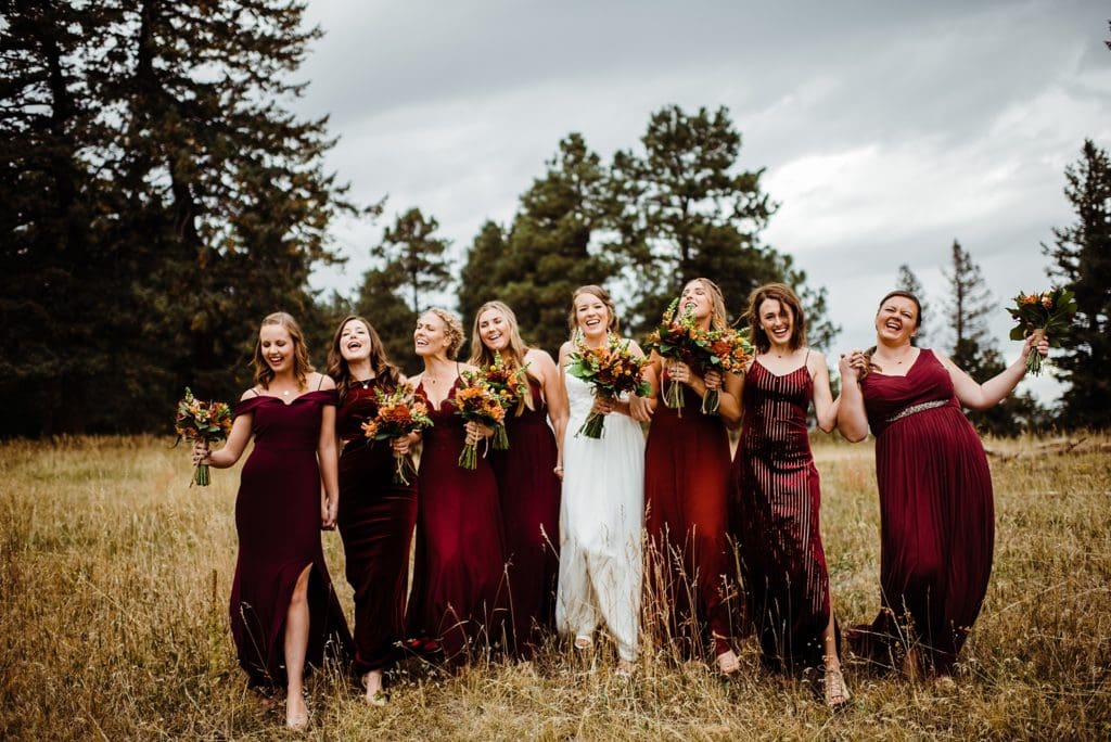 large wedding party in maroon and gray