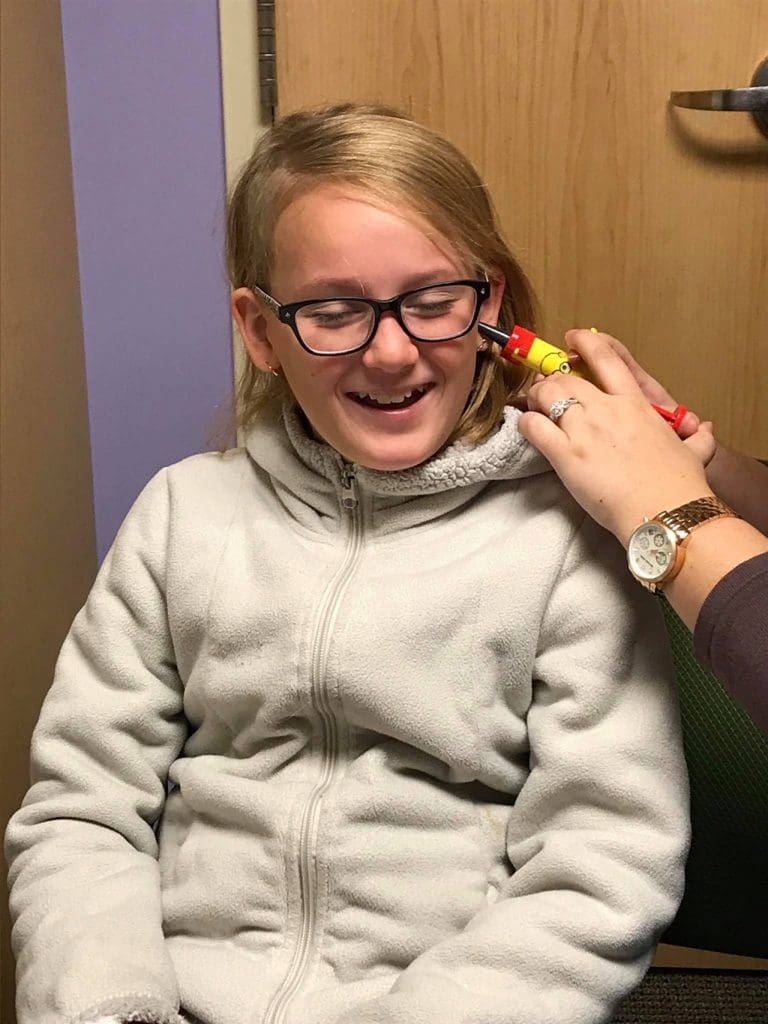 getting fitted for a hearing aid