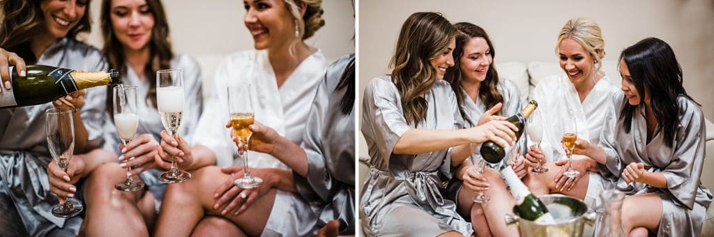 bride with bridesmaids drinking champagne together