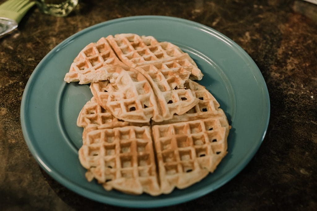 homemade waffles on a green plate