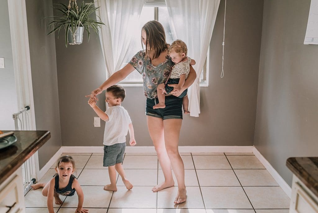 mom of three dancing with her kids