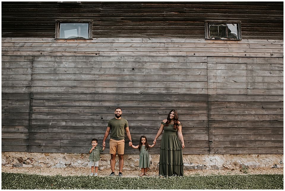 family session in front of old barn