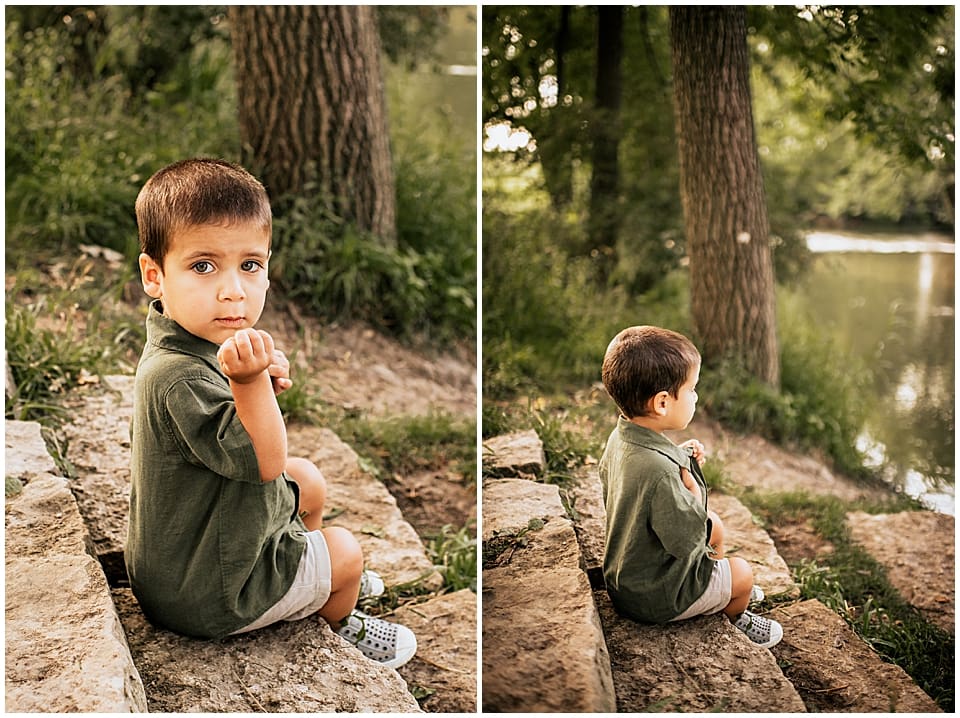 little boy sitting on river steps