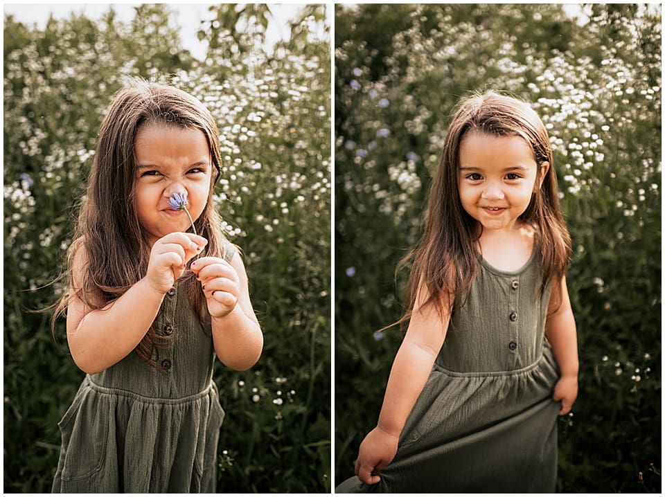 3 year old girl making silly faces with flower