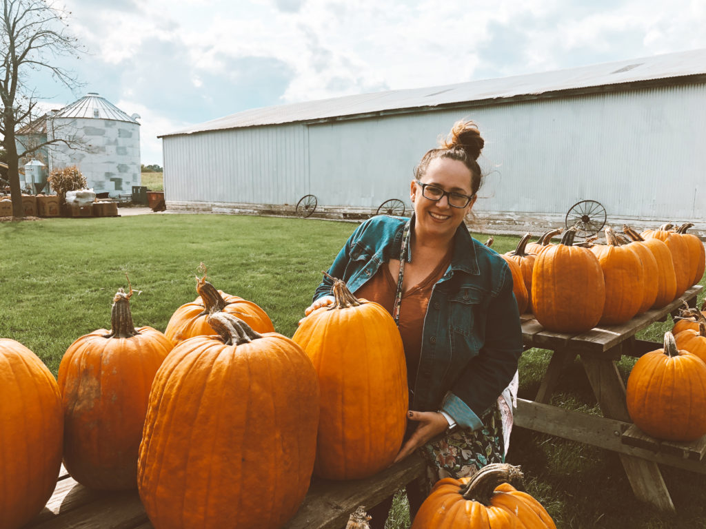 Ashley Durham with pumpkins at Meyer Family Farms in Salem Wisconsin