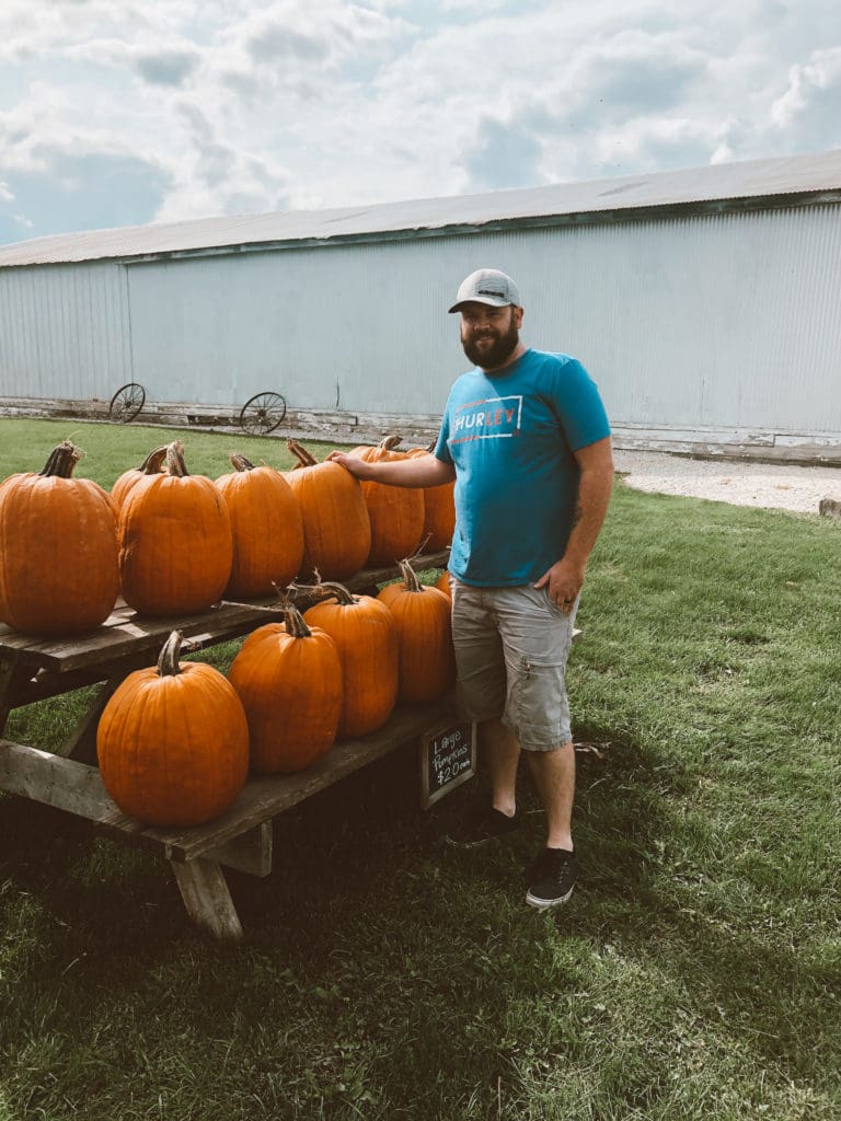 randy with the big pumpkins at meyer family farm in salem