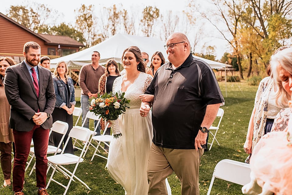 father walking bride down the aisle