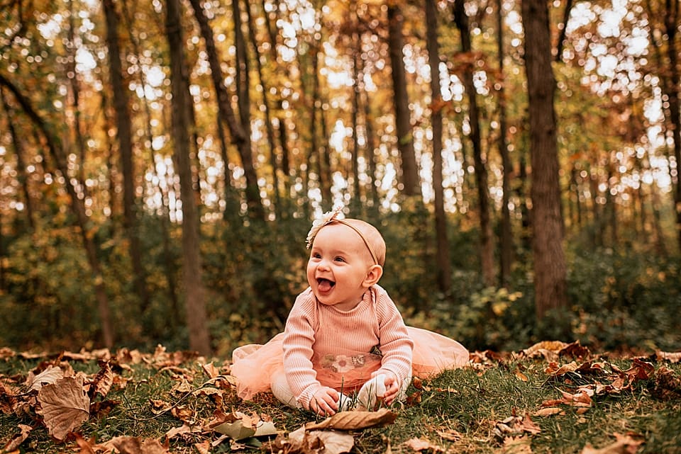 6 month old baby girl in the fall in wisconsin