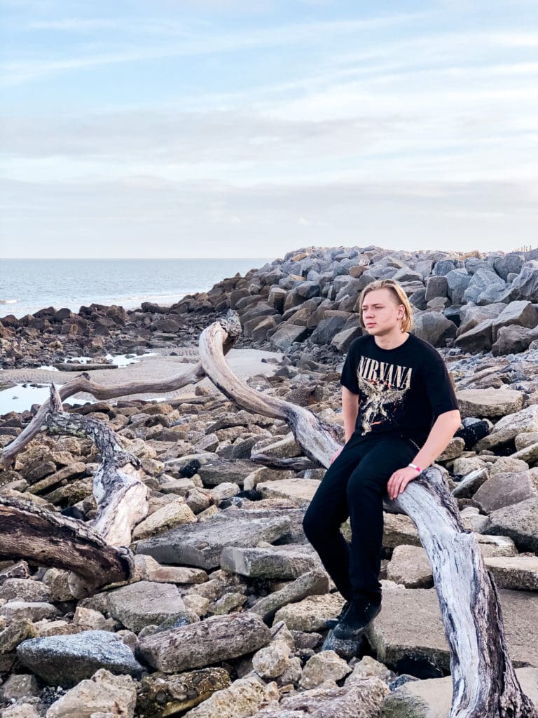 teenager at driftwood beach