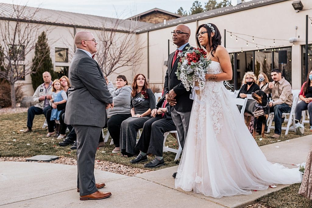 father walking daughter bride down the aisle