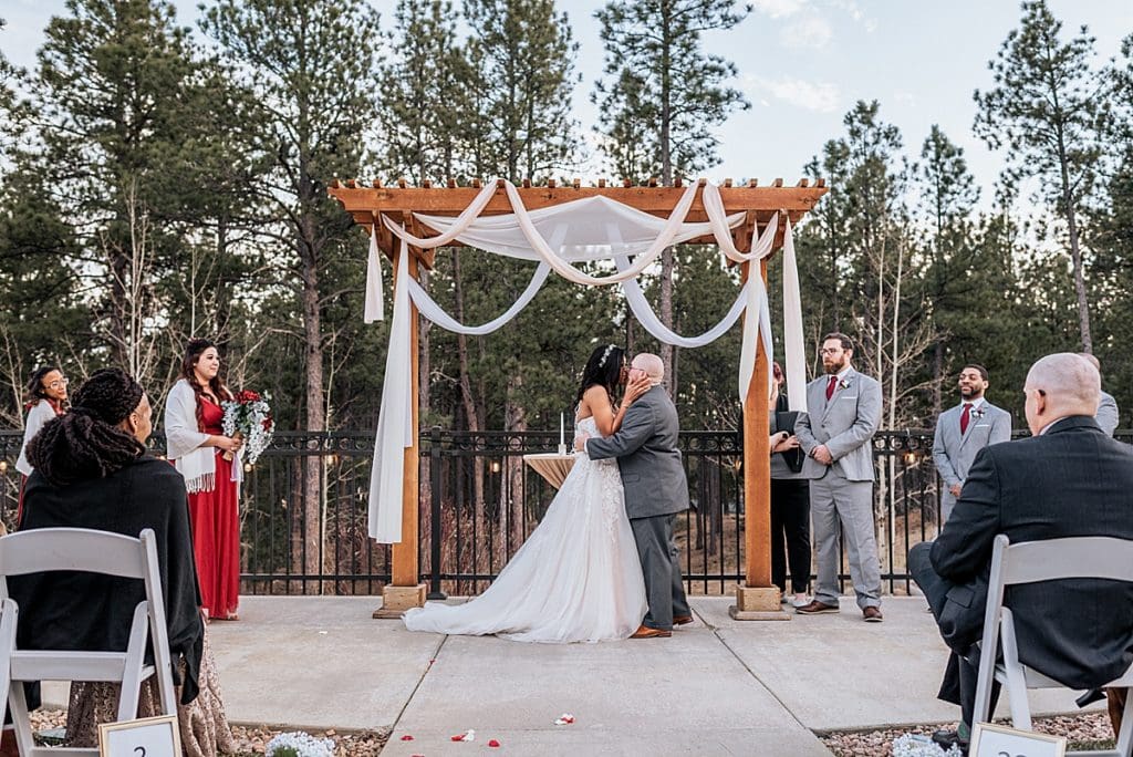 first kiss at wedgewood black forest wedding outdoor ceremony