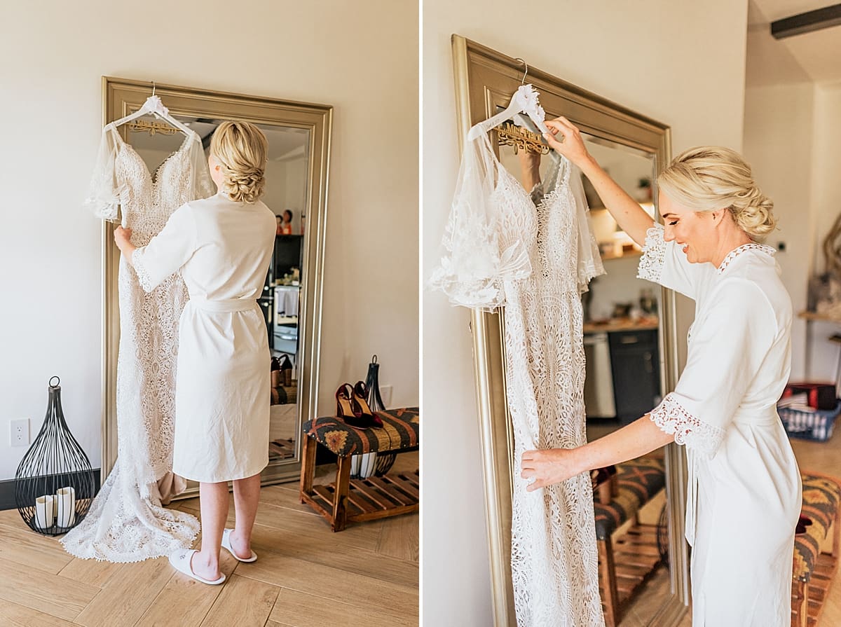 bride taking dress off hanger