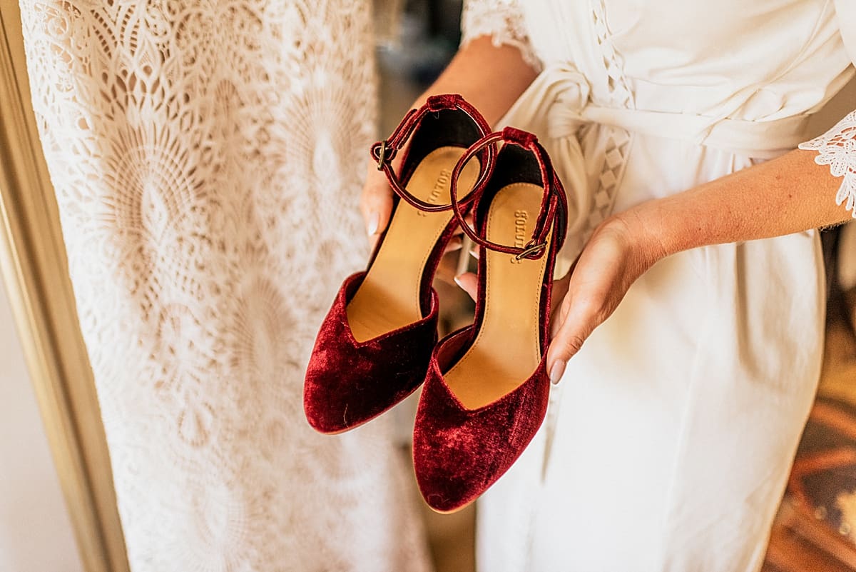 bride holding platform heels
