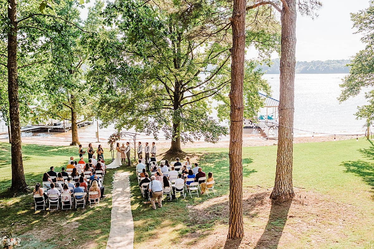 outdoor wedding next to a lake