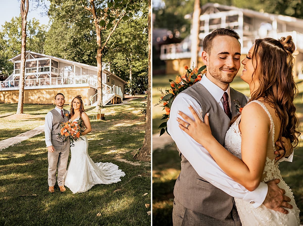 bride and groom in front of lake house