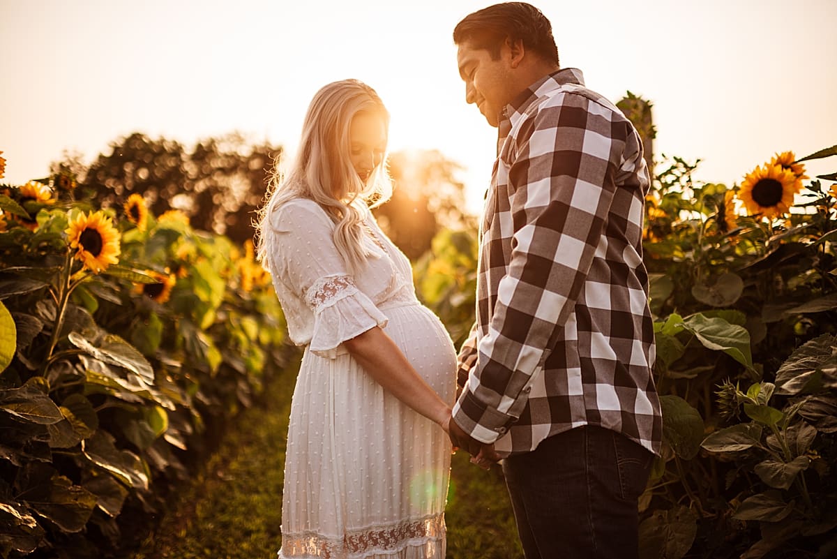 happy expectant parents during maternity photography session
