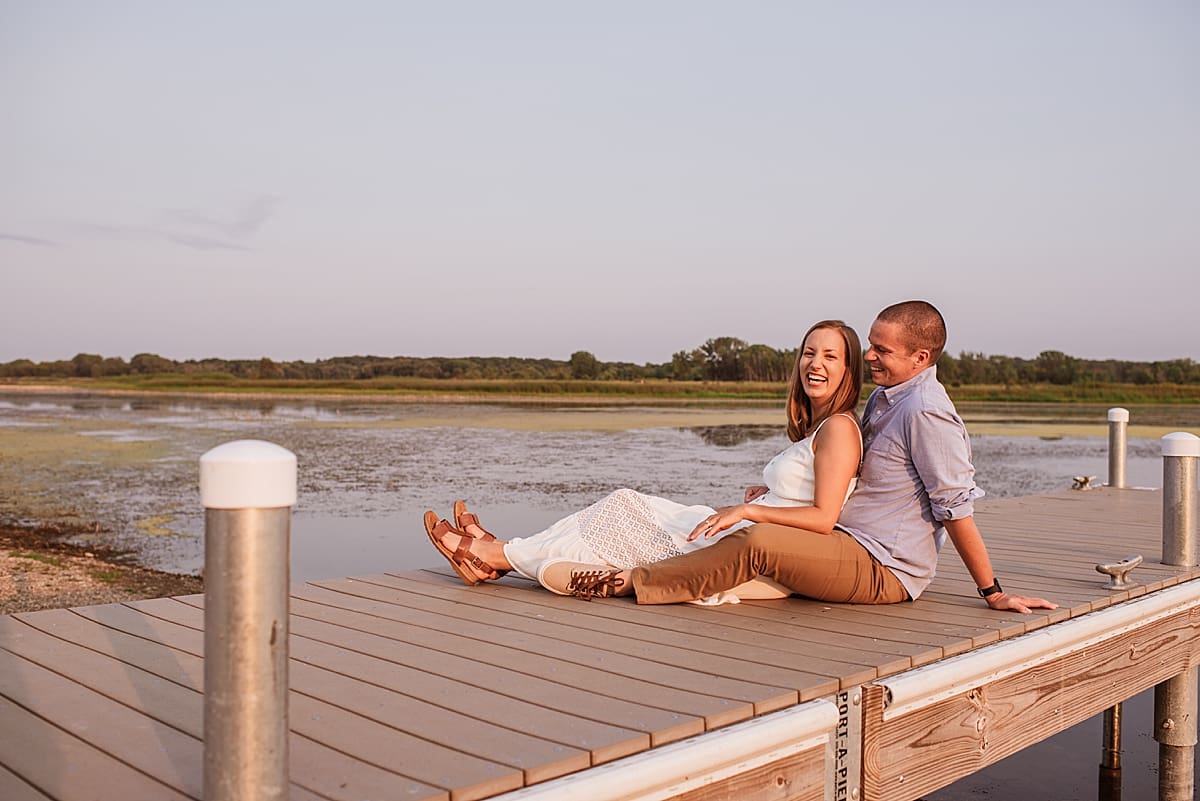 couple sitting together on a dock