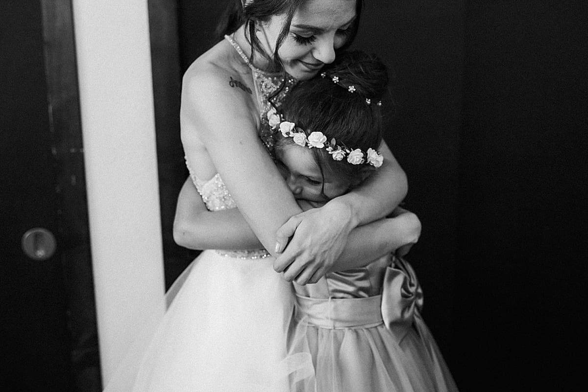bride with daughter flower girl before the ceremony