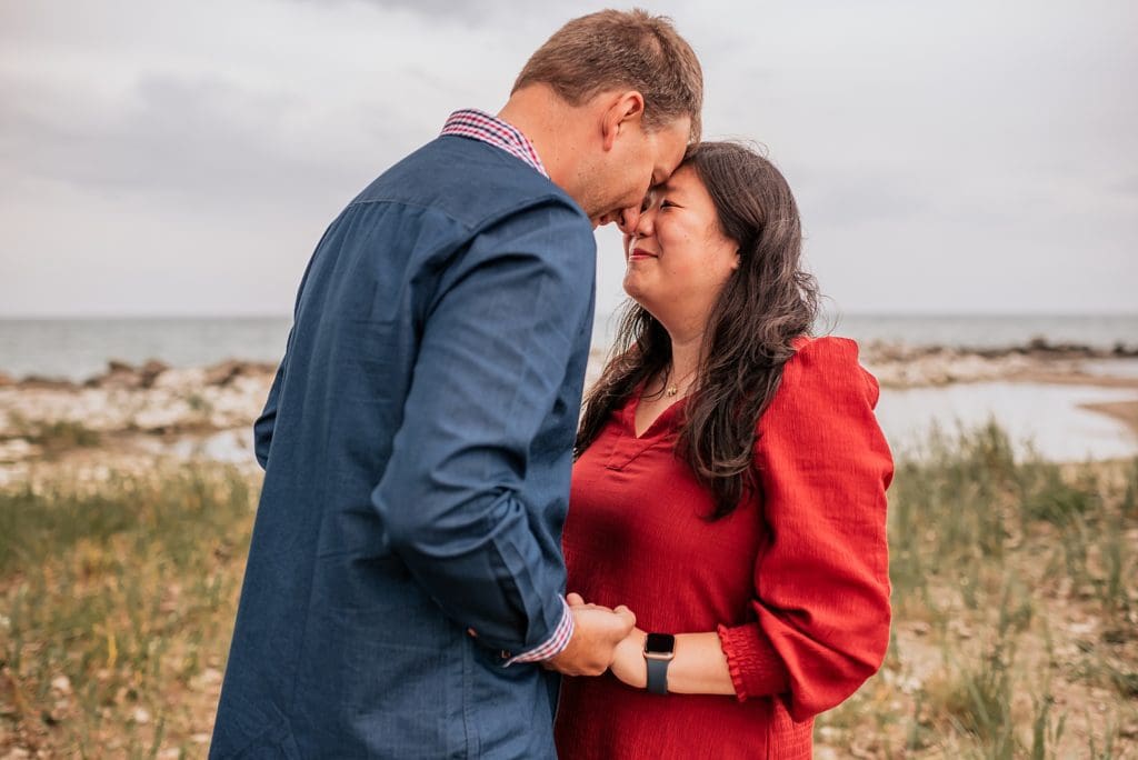 engagement session in front of lake michigan