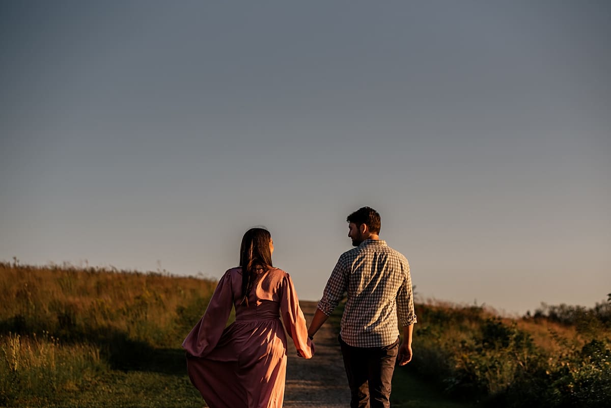 couple walking together in the sunset
