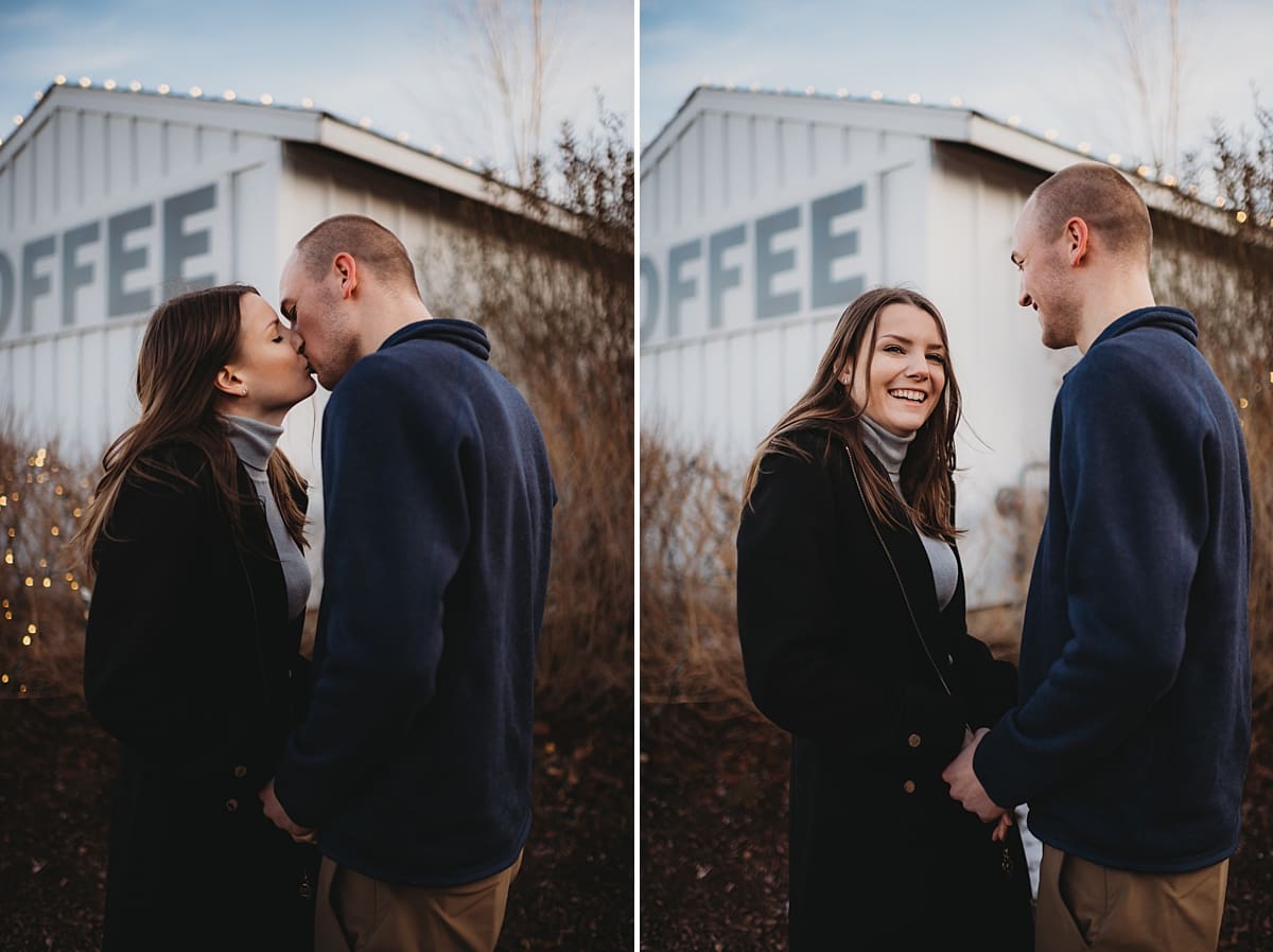 couple kissing at boxed and burlap engagement session