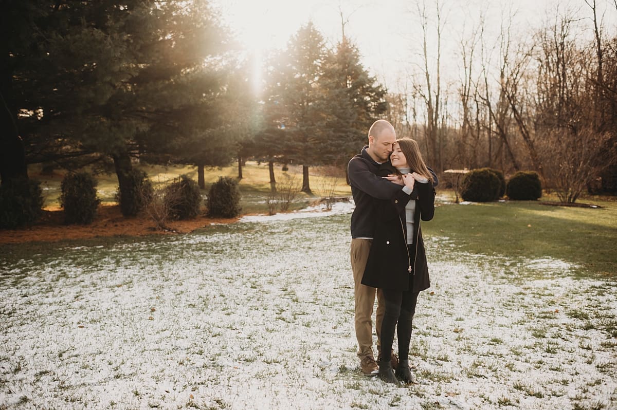 sprinkle of snow on the ground for engagement session