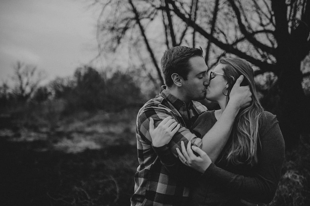 man and woman embraced in passionate kiss