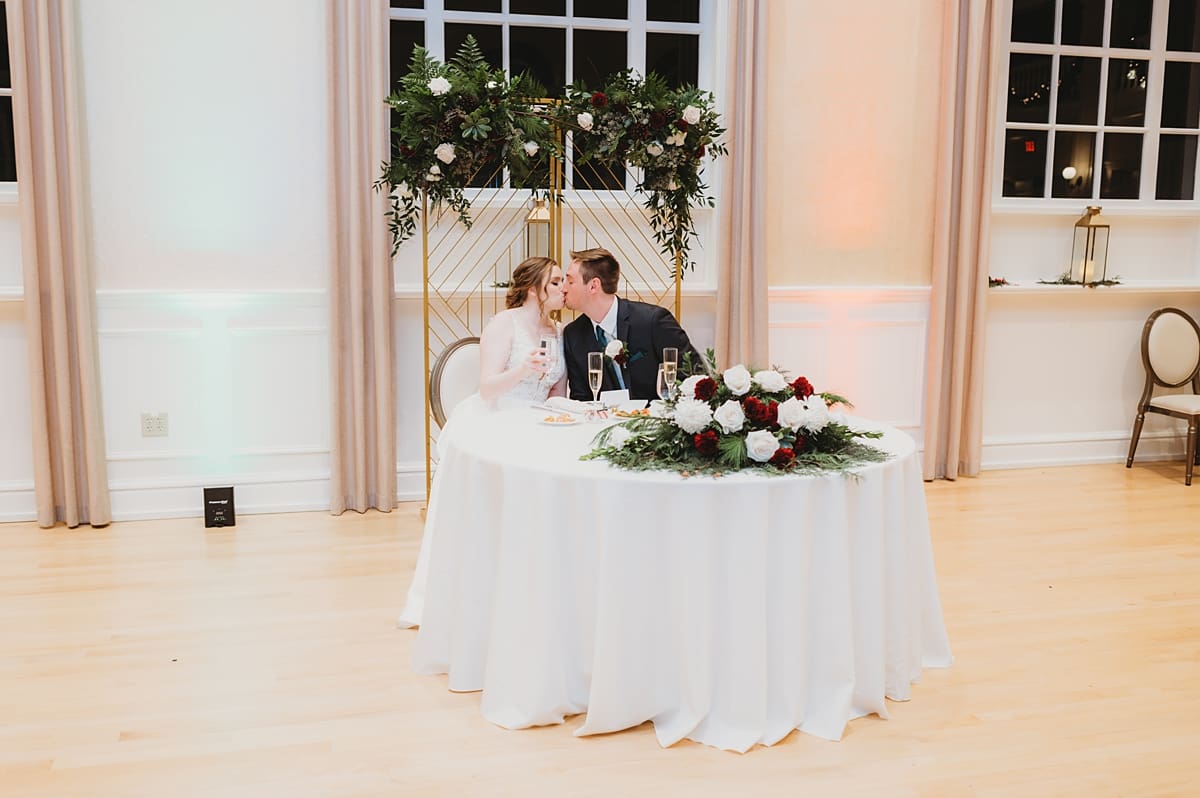 wedding toasts at nighttime indoor wedding reception