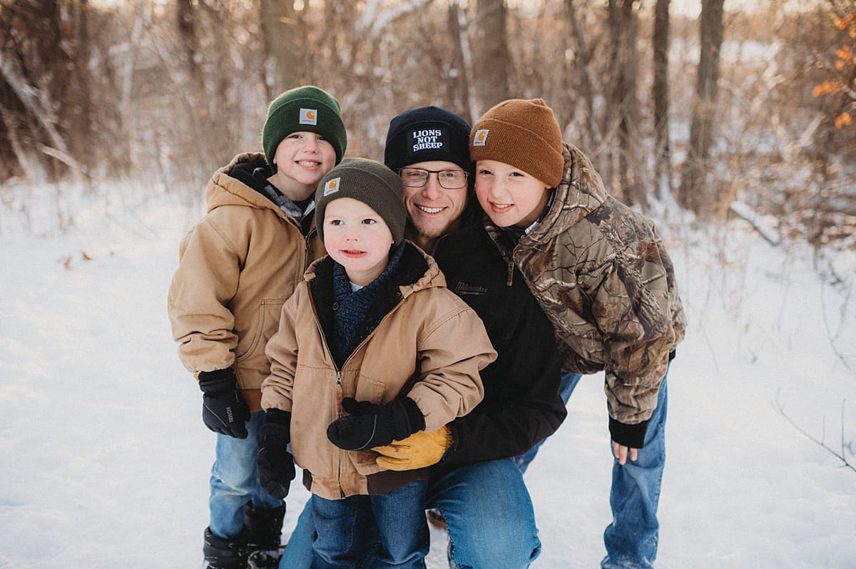 dad with kids during wintery session
