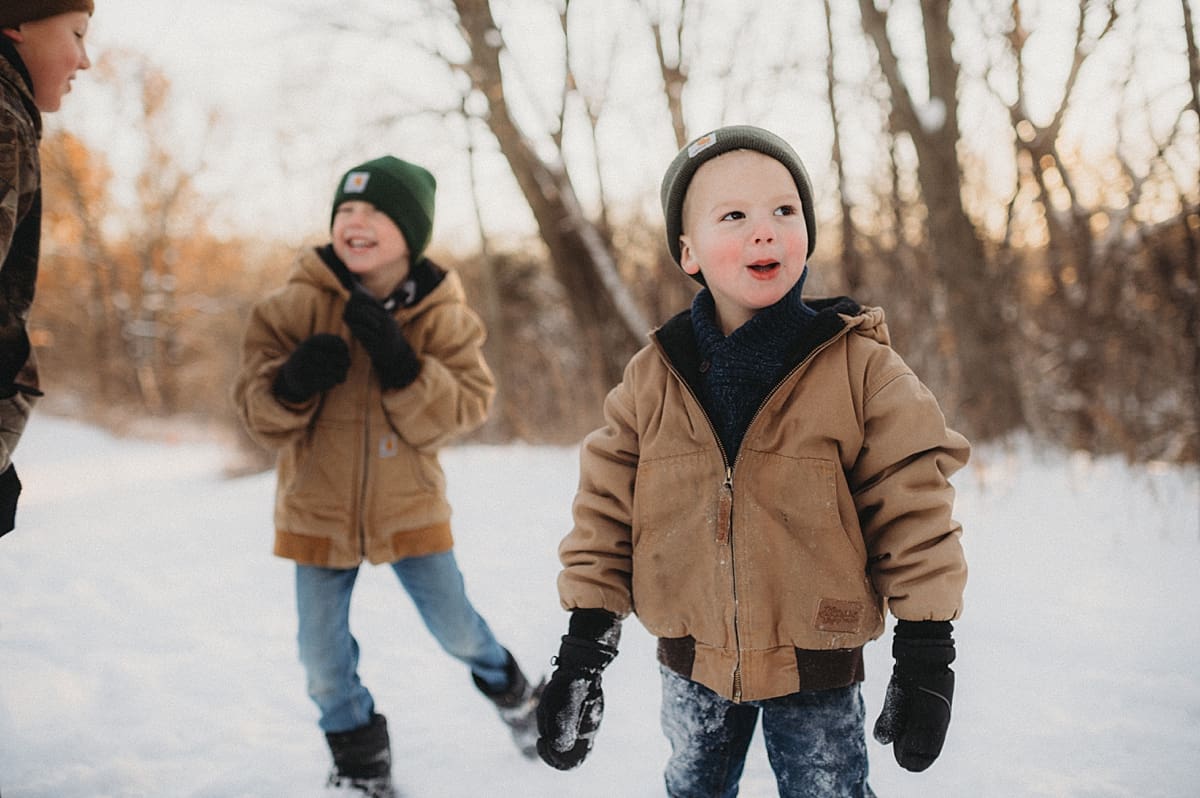 shocked by snow while kids play