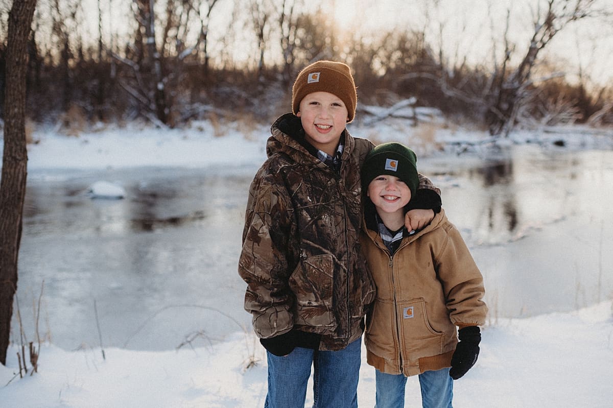 Brothers hugging during family photos at White River County Park in Lake Geneva