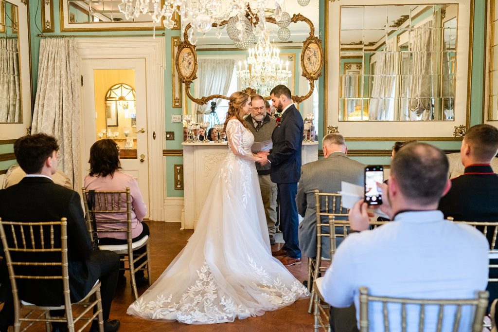 indoor wedding ceremony at maxwell mansion in lake geneva