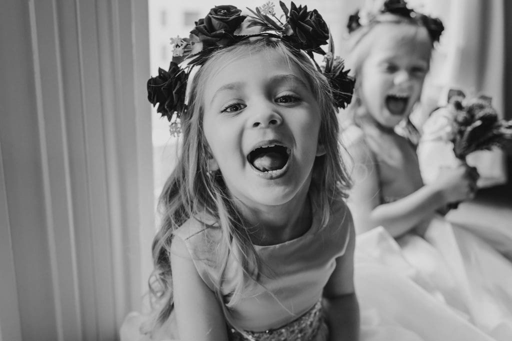 silly flower girl sticking her tongue out