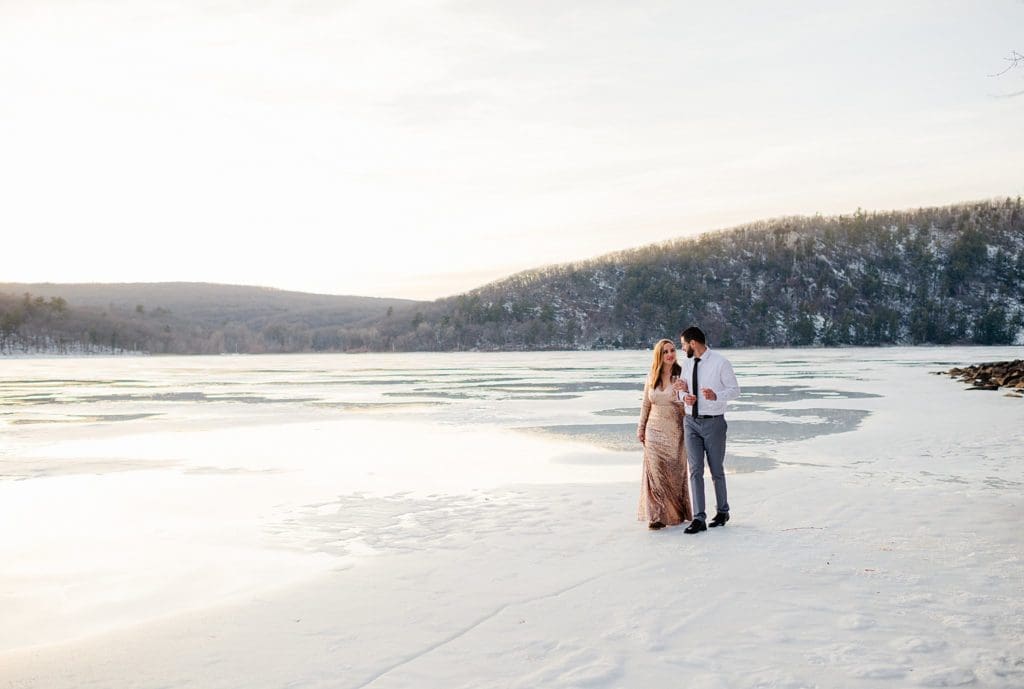 frozen lake engagement session in wisconsin