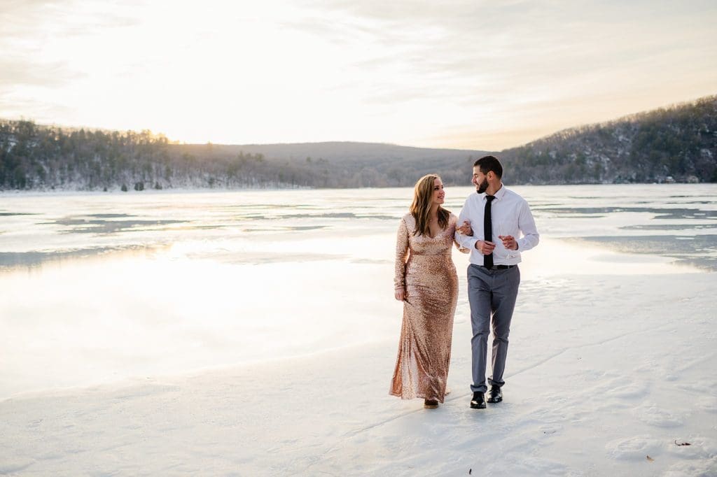 frozen lake engagement session in wisconsin