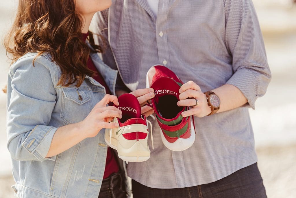 couple with custom wedding nikes