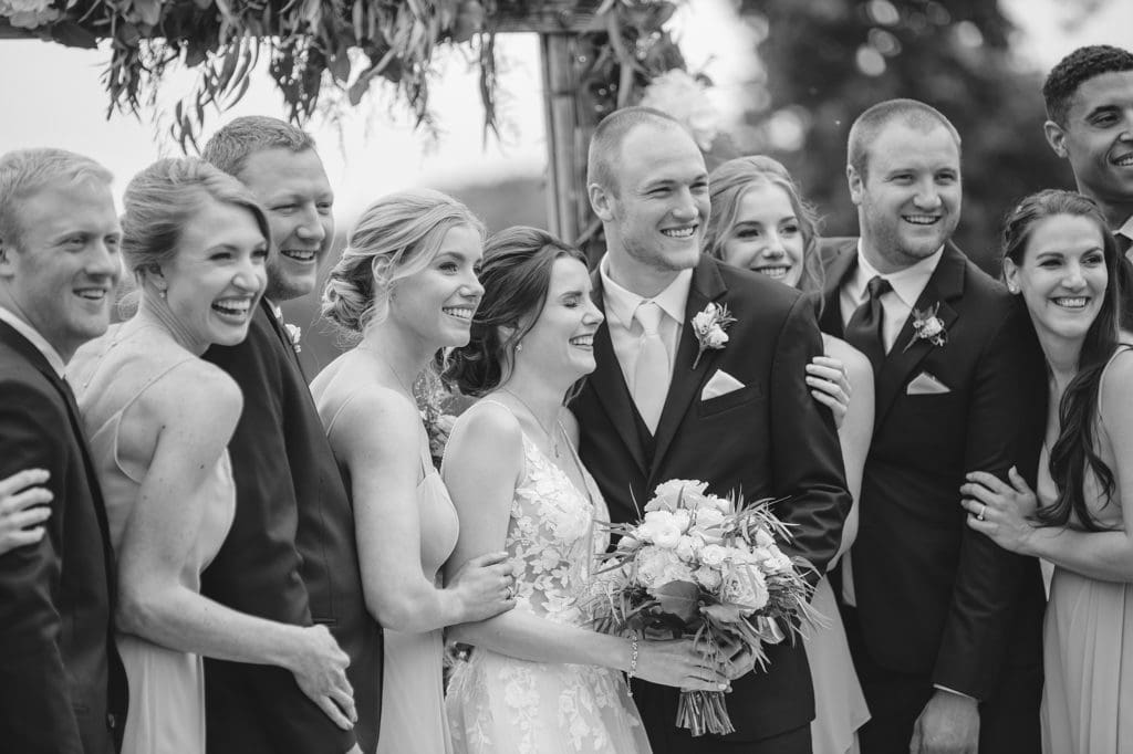 large wedding party in mint green and navy blue madison wedding photographer