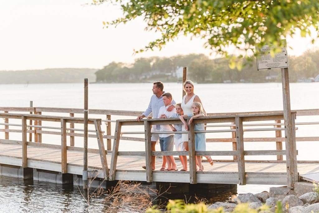 family photos on lake dock
