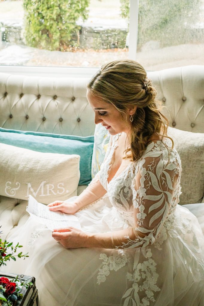 bride reading vows before wedding