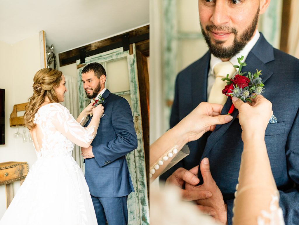 bride putting boutonniere on groom