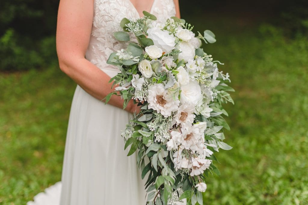 bride with waterfall bouquet