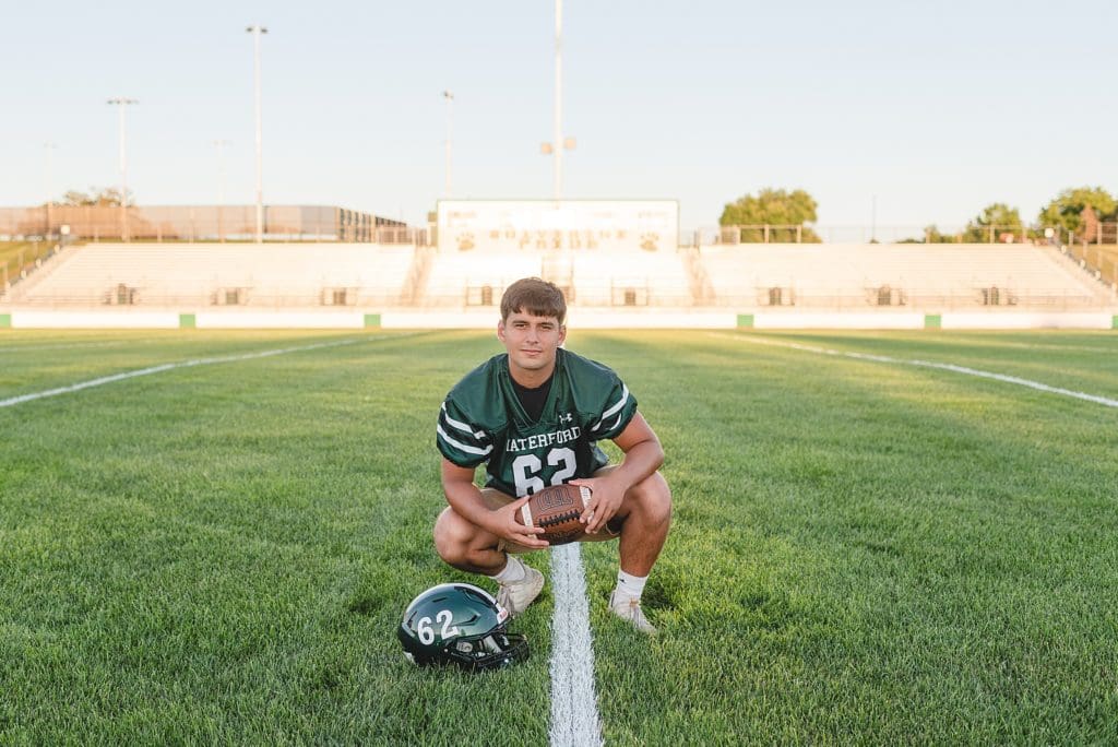 football player senior photography in wisconsin