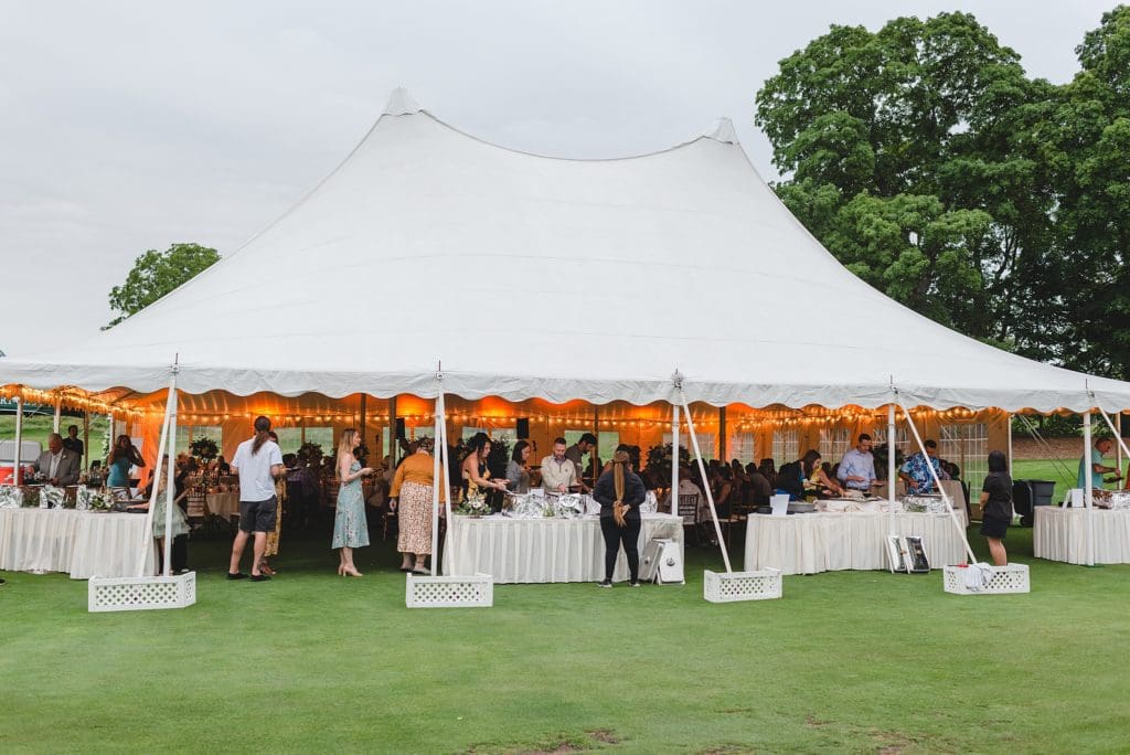 tented outdoor wedding reception at westmoor country club