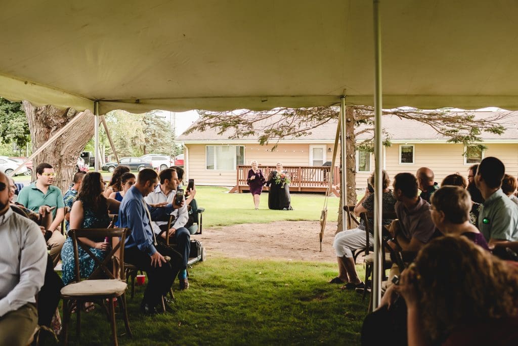 tented outdoor ceremony in the backyard