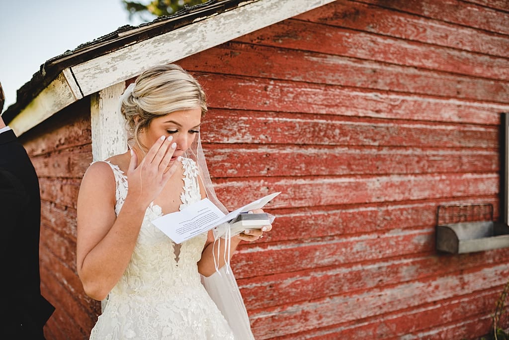 emotional first touch with bride and groom before wedding ceremony